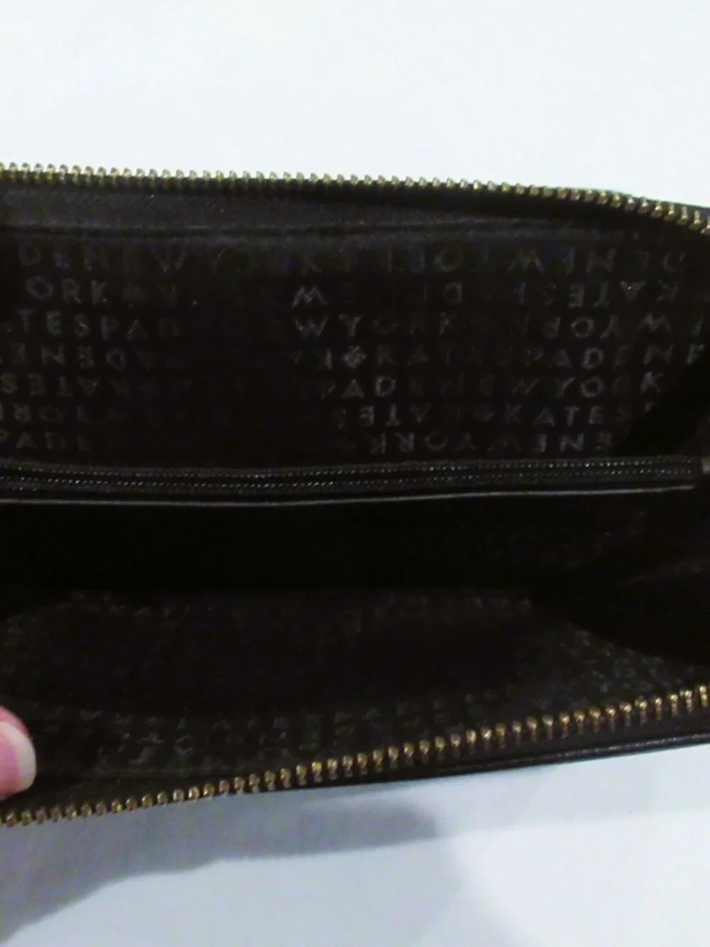 Kate Spade New York black leather wristlet / wallet
